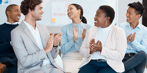 Image showing Support, motivation and success with a business team clapping during a workshop for learning, coaching and development. Collaboration, teamwork and goal with a crowd in celebration of an achievement