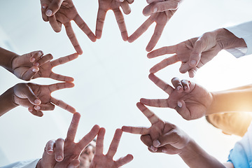 Image showing Peace, team building and hands of business people with star shape using teamwork, support and global solidarity. Collaboration, below and group of workers in a huddle with our vision in a company