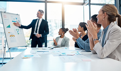 Image showing Meeting, presentation and applause with a business man training his team during a boardroom workshop. Leadership, education and strategy with a CEO, manager or leader coaching his employee staff