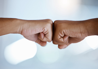 Image showing Fist bump, support and employees meeting for partnership, collaboration or business together at work. Hands of corporate workers greeting with thank you, motivation or trust in a goal and strategy