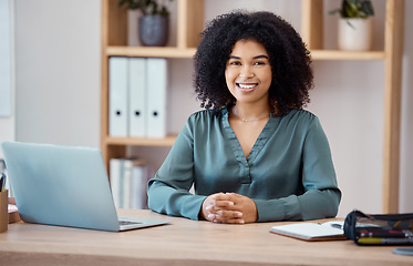 Image showing Portrait of a black woman, office desk and professional business employee consultant in the workspace. Corporate finance worker, working with a laptop and notebook in modern marketing startup company