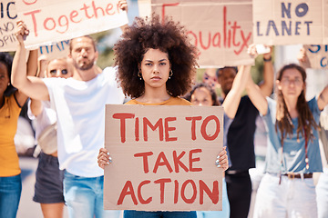 Image showing Protest, poster and black woman, crowd or equality, human rights or racism protesters in city. Activism, action time or angry group demand freedom, end to racial discrimination or government change.