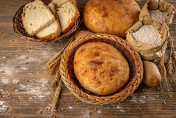 Image showing Sliced and whole sourdough bread