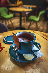 Image showing Blue ceramic cup of tea