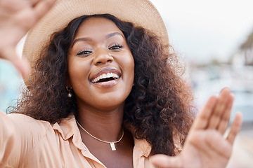 Image showing Black woman, portrait smile and travel hands for picture perfect day on summer vacation in the outdoors. Face of happy African female traveler smiling with hand frame for capture or photography