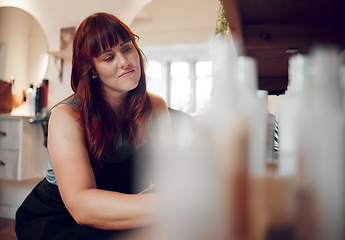 Image showing Woman, salon and shelf smile with product, shampoo and stock at work in hair care, style and beauty. Small business owner, hairdresser and entrepreneur at job, shop or store with relaxer, oil or gel