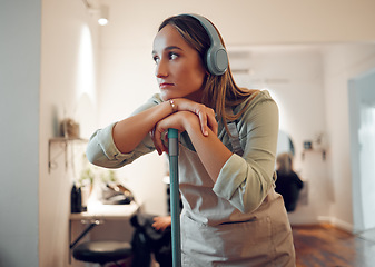 Image showing Woman, cleaning and tired with music in headphones while cleaning room in home. Cleaner, thinking and contemplating while listening to radio, podcast or streaming with rest, exhausted and burnout