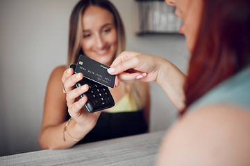 Image showing Hands, woman and credit card tap to pay on electronic machine for wireless transaction at cafe. Hand of female in contactless payment tapping on scanner for purchase at a coffee shop or restaurant
