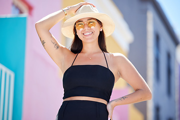 Image showing Happy woman on holiday, spring portrait city adventure and weekend lifestyle in Los Angeles. Summer fashion sun hat, smile and young Asian gen z girl on urban travel vacation and happiness in a town