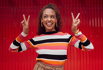 Image showing Peace sign, comic and black woman against red wall in the city of Amsterdam for holiday, travel and adventure. Thinking, fashion and young girl with crazy, and funny idea on vacation with smile