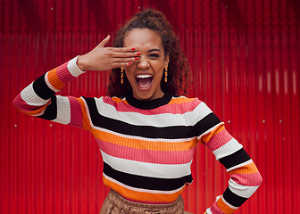 Image showing Hand, cover and urban fashion portrait with quirky latino woman in city with happy and cute pose. Young, trendy and optimistic smile of Gen Z girl with colorful clothes and joyful personality.