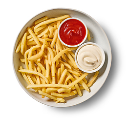Image showing french fries with ketchup and mayonnaise