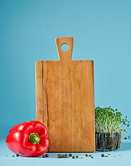 Image showing still life with wooden cutting board