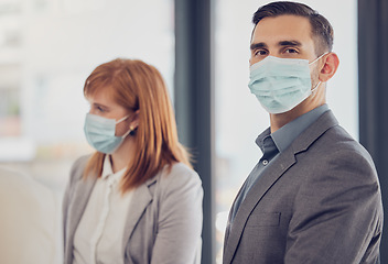 Image showing Covid, face mask and business people in office meeting after lockdown in safe, clean and healthy workplace. Leadership man portrait with vision for positive future with protection against coronavirus