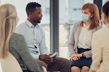 Image showing Covid, corporate and employees in a meeting for business, networking and collaboration in office at work. Team of workers, business people and staff talking with face mask at a professional company