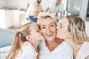 Image showing Grandma, family and child giving a kiss on cheek and senior woman with smile sitting with mother and child on sofa at home. Portrait of happy grandparent bonding with girl and daughter on mothers day