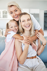 Image showing Portrait of grandmother, mother and girl child with smile sitting on sofa to relax, bond and hug. Happy grandma, mom and kid relaxing on couch together in living room of the family home in Australia.