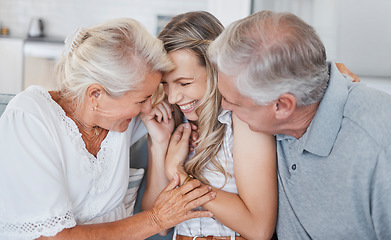 Image showing Family, senior parents and adult daughter or woman at home during visit with her mother and father while laughing, happy and showing love and care. Smile of women and man together on the sofa to bond