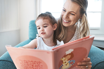 Image showing Book, family and love with a mother and daughter reading a story on a couch in the living room of their home together. Children, love and education with a woman and daughter bonding over a storybook