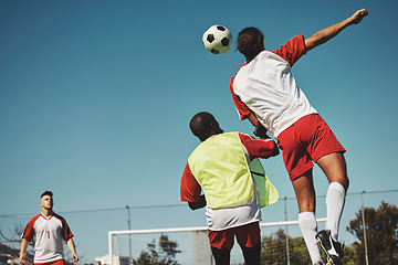 Image showing Sports game fitness, soccer jump and athlete play competition for exercise, workout or training for body health. Rival, team and street football for practice, wellness and cardio with mockup blue sky