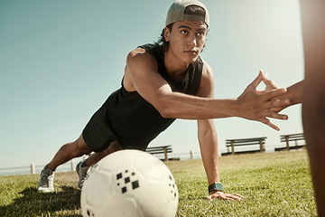 Image showing Soccer, fitness and friends doing push up on grass in summer holidays for training, exercise and body workout. Football, healthy and young men hands touching while exercising outdoors in Sao Paulo