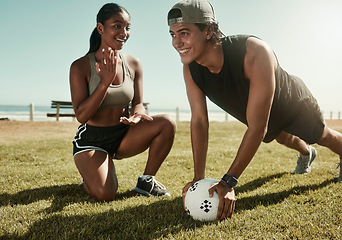 Image showing Soccer, sports and coach with a man athlete training outside for fitness or exercise with his personal trainer. Football, workout and health with a male listening to coaching on a field of grass