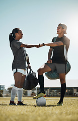 Image showing Fist bump, soccer and football teamwork success for exercise health, friends goal and training. Fitness collaboration, community and sports people before a game on a sport field together with a smile