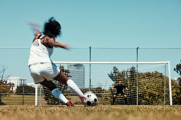 Image showing Woman, score and net for goal in soccer, training and sports on field for fitness, health and exercise. Girl, football and kick, aim and workout on grass for sport in summer, sunshine and game