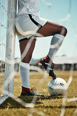 Image showing Soccer, ball and shoes of athlete on grass for training practice in fitness, sports and health. Motivation, exercise and workout with soccer player on football field for goals, wellness and games