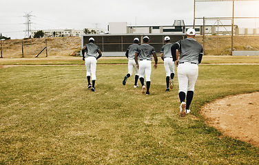 Image showing Baseball, sports and team running on field ready to start training match, fitness workout and exercise together. Academy, teamwork and young men playing a game on grass or pitch outdoors in Dallas