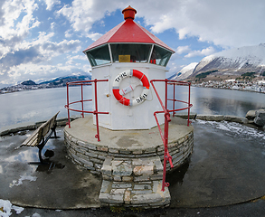 Image showing A Quaint Lighthouse on a Dock