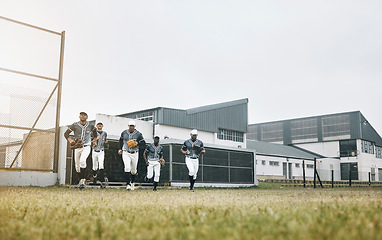 Image showing Sports, field and baseball player team running on a stadium field, ready for competitive game. Fitness, energy and athletic men at baseball field for exercise, health and training workout match