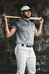 Image showing Man, baseball and bat while thinking, focus and determination in match, game or sport. Baseball player, serious and contemplating in sports, tournament or competition for championship