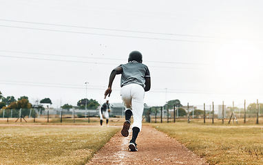 Image showing Baseball player, running and sports pitch with athlete with fast energy doing base run at game or match on a sport field. Fitness, exercise and training workout with sport runner male outdoor