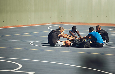 Image showing Basketball, team and stretching on sports court to warm up for training, cardio exercise and workout outdoors in Atlanta. Fitness, teamwork and healthy athletes ready to start exercising or practice