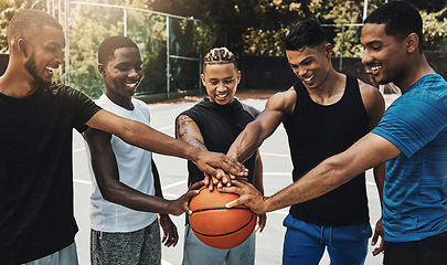 Image showing Training, friends and community support by basketball players hand connected in support of sports goal and vision. Fitness, trust and motivation on basketball court by happy, united professional men