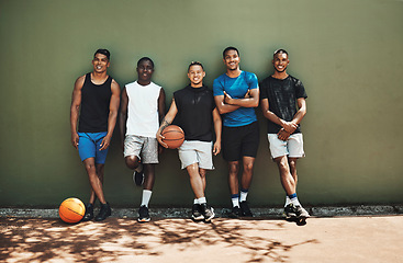 Image showing Sports, basketball and team at court training for a game, match or competition with a smile. Portrait of athletes, workout and diverse group of men playing sport for exercise, fitness and health