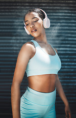 Image showing Fitness, headphones or black woman listening to music for workout motivation, wellness or stress relief. Young gen z girl streaming radio song or audio podcast for sports exercise, cardio or training