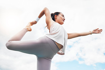 Image showing Yoga exercise woman and bow balance, stretching and outdoor fitness, wellness and mindfulness on cloud blue sky background. Below of healthy pilates training, strong body focus and zen mindset energy