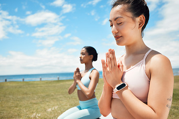 Image showing Fitness, yoga and woman in spiritual wellness, exercise and training workout for mental wellbeing in nature. Women in meditation pose on grass in calm, peace and zen for healthy mind, body and spirit