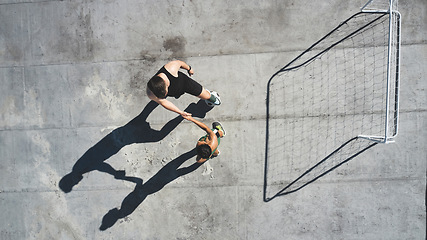 Image showing Soccer, sports and handshake with a man and woman athlete shaking hands after a game on a rooftop from above. Football, exercise and training with a male and female playing a match for health