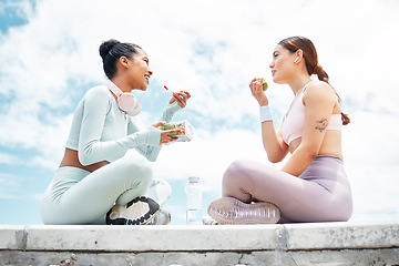 Image showing Salad, apple and fitness friends eating food outdoor for wellness, diet and vegan lifestyle with blue sky clouds mock up. Women or people with green fruits and vegetables lunch after an exercise