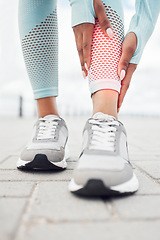 Image showing Fitness, injury and woman with shin pain during cardio exercise, training or outdoor workout. Closeup of an athlete with a sports accident, muscle sprain or medical emergency while running outside.