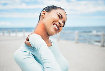 Image showing Woman, injury and neck pain in sports exercise, workout and training suffering with ache in the outdoors. Female in agony holding painful body, muscle or inflammation in sport accident during fitness