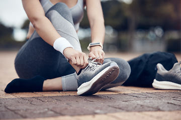 Image showing Fitness, runner and woman with shoe lace in sports motivation for workout, exercise or training in the outdoors. Female tying shoes for a run in healthy sport for cardio exercising in a urban town