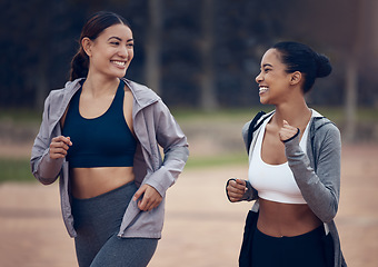 Image showing Fitness, nature and friends running for an outdoor cardio workout or sports marathon training. Freedom, exercise and happy healthy women runners on a run in a park for health, wellness and motivation