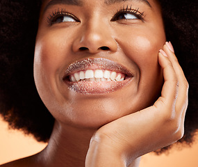 Image showing Black woman, lip sugar makeup or skincare health of exfoliate model with smile on orange studio background. Natural healthy, smooth skin and happy with beauty cosmetic hair treatment model
