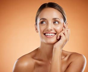 Image showing Face, portrait and skincare for beauty woman with smile for facial health against an orange mockup studio background. Cosmetic model happy about natural wellness and dermatology with mock up space