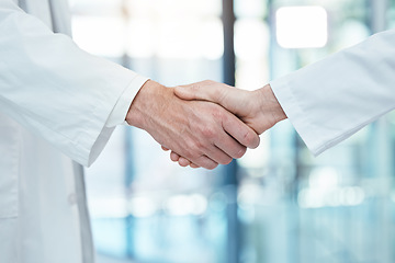 Image showing Handshake, doctors meeting or teamwork for partnership, collaboration or support for medical success in hospital. Healthcare, health or shaking hands for thank you, welcome or trust for surgery help