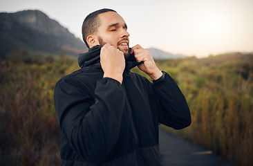 Image showing Man breathing in nature, mountain forest peace and spiritual wellness meditation in Canada winter. Calm breathe of fresh air, natural outdoor freedom of faith and relax in fresh green trees in woods